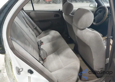 1997 Toyota Corolla Dx z USA, uszkodzony, nr VIN 2T1BB02E3VC181698